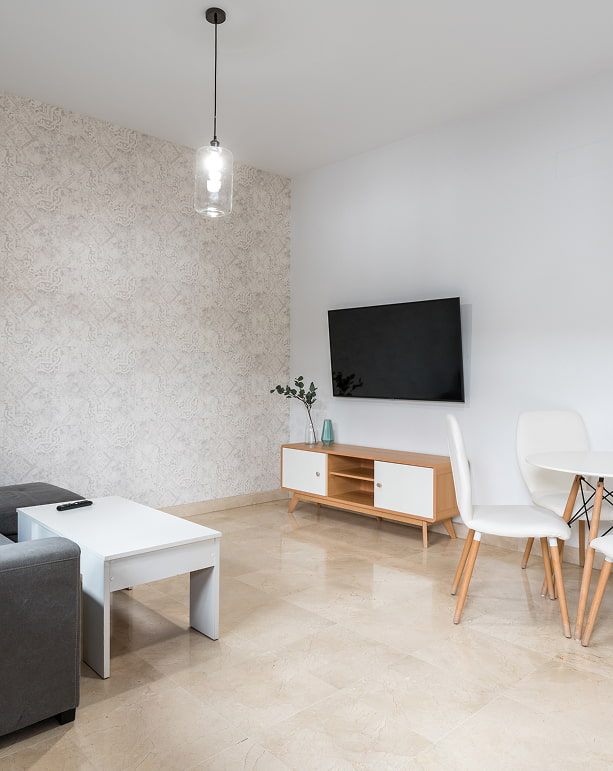 Apartamentos en Sevilla Sala de estar de uno de los apartamentos en Sevilla de Hoteles del Sur